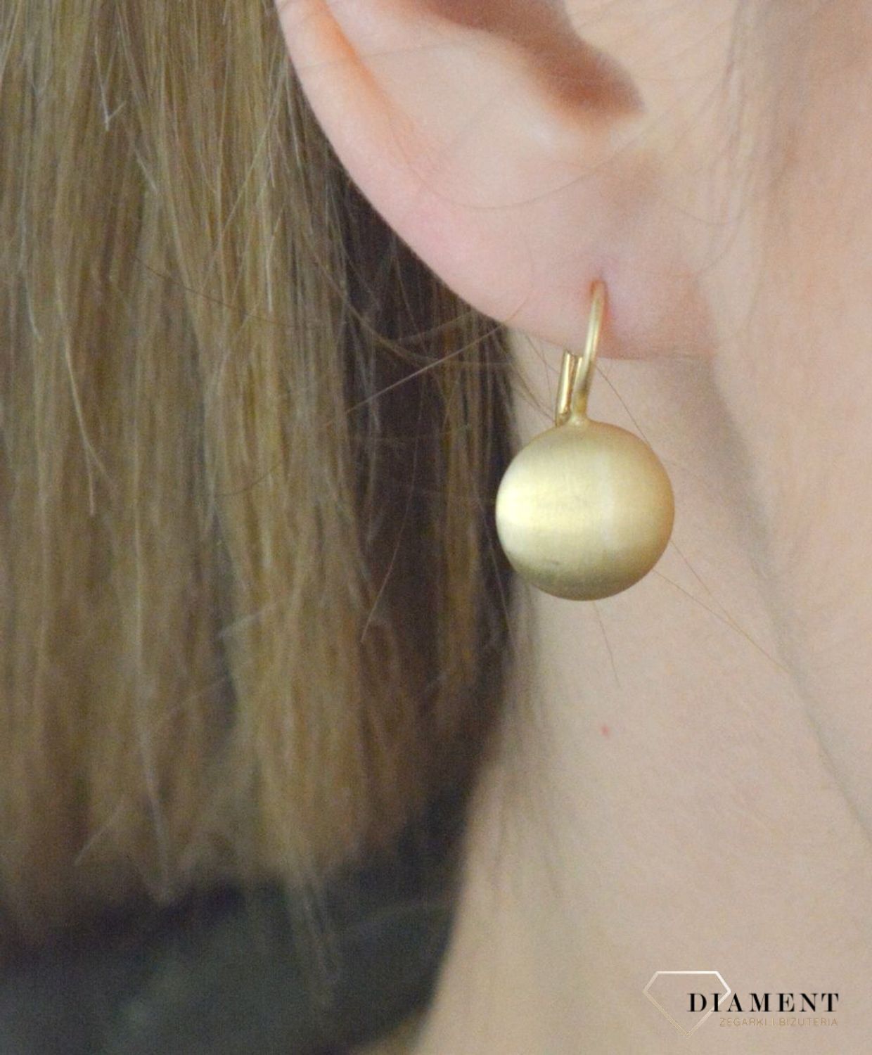 Srebrne kolczyki okrągłe matowe w pozłoceniu DIA-KLC-Z0310220-925. Kolczyki wykonane z srebra próby 925 w pozłoceniu żółtego złota. Biżuteria w macie to jeden z najnowszych trendów. Modne kolczyki będą doskonałym prezentem..jpg