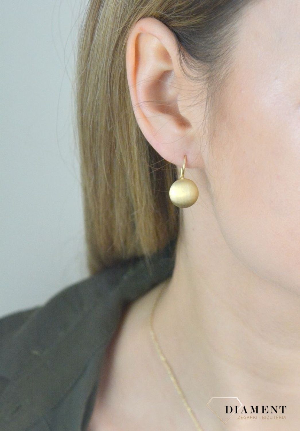 Srebrne kolczyki okrągłe matowe w pozłoceniu DIA-KLC-Z0310220-925. Kolczyki wykonane z srebra próby 925 w pozłoceniu żółtego złota. Biżuteria w macie to jeden z najnowszych trendów. Modne kolczyki będą doskonałym prezentem..jpg
