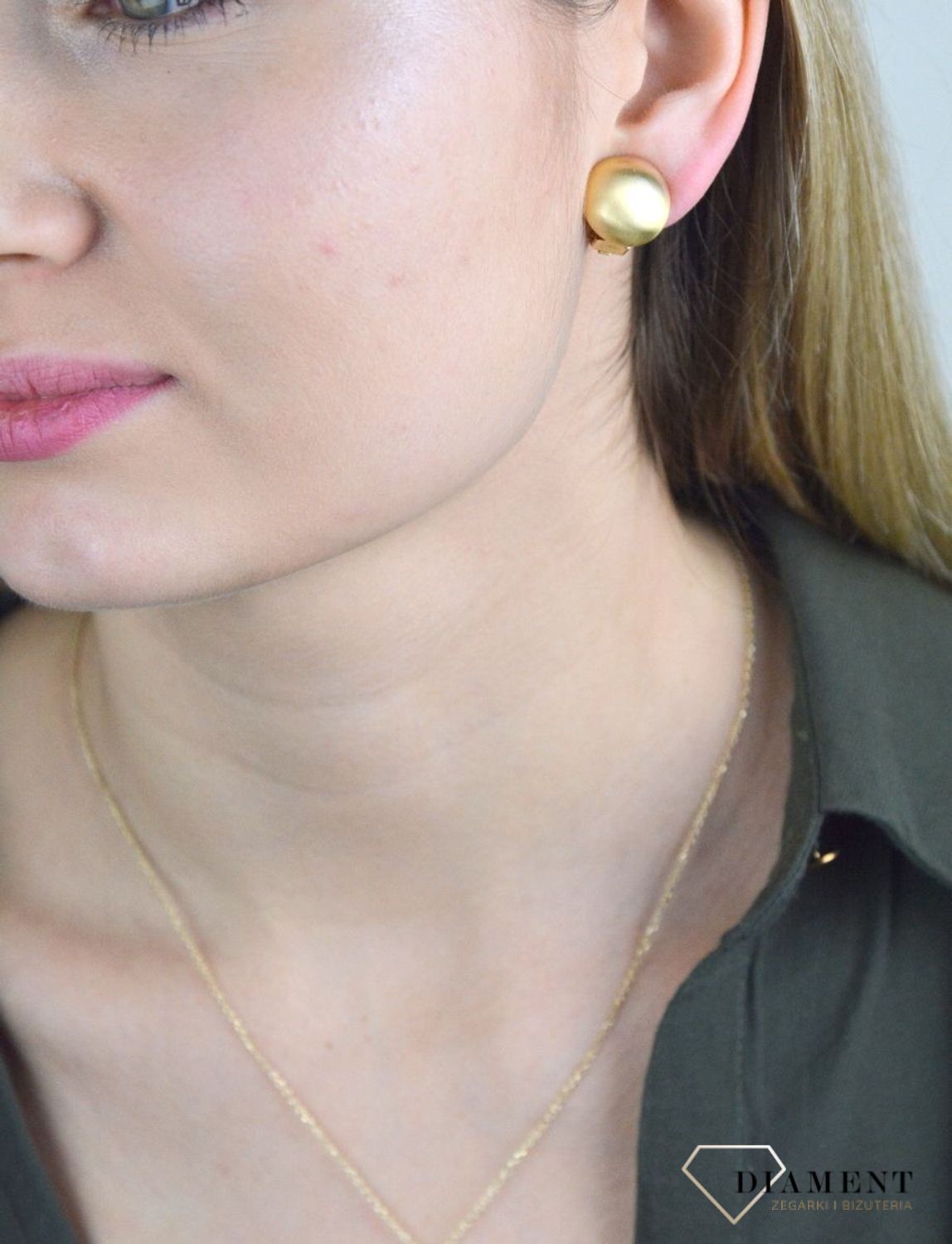 Klipsy srebrne kulki matowe w pozłoceniu DIA-KLI-Z0310271-925. Klipsy będą doskonałym dodatkiem do codziennych jak i wieczorowych kreacji. Minimalistyczny dodatek ożywi stylizację. Do kolczyków można dopasować łańcuszek oraz.jpg