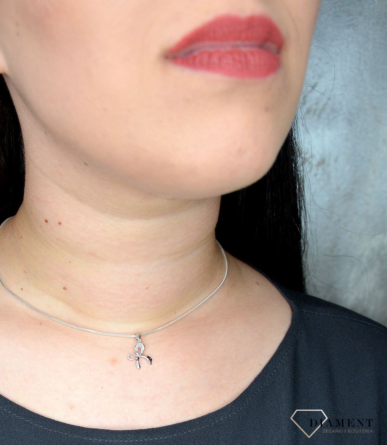 Srebrny komplet biżuterii w kształcie kokardki DIA-KPL-0799-925 (2).jpg