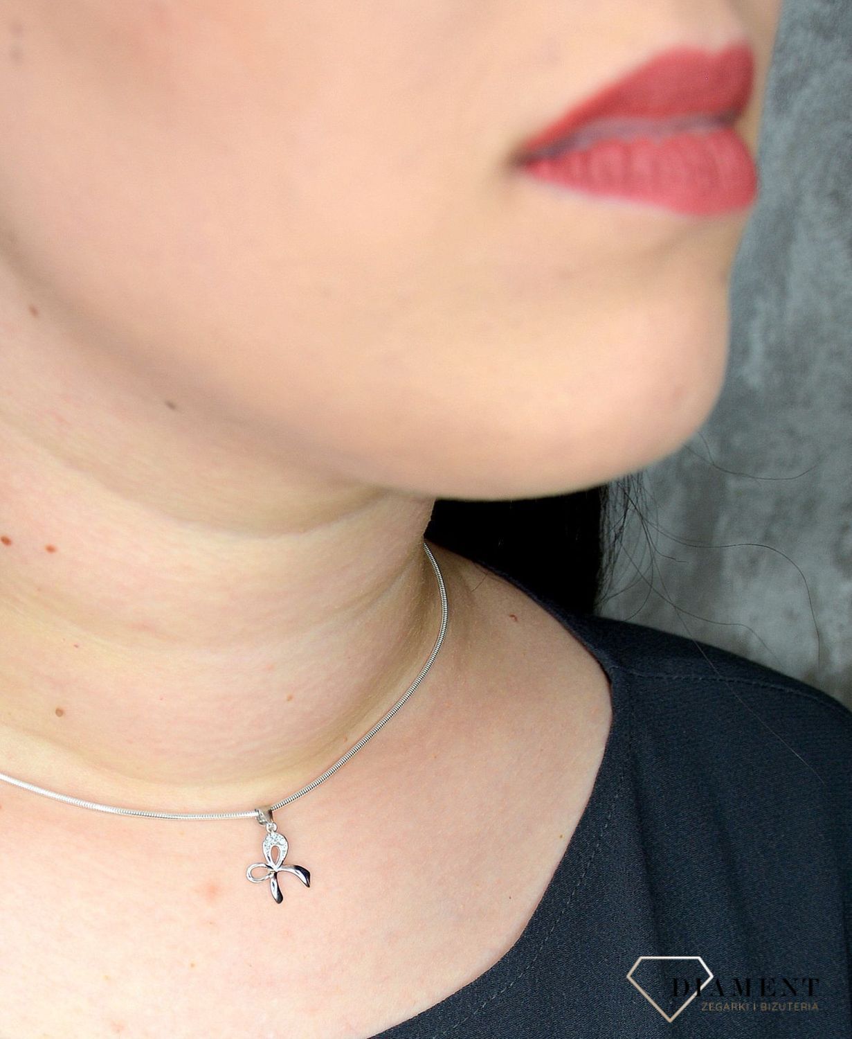 Srebrny komplet biżuterii w kształcie kokardki DIA-KPL-0799-925 (2).jpg