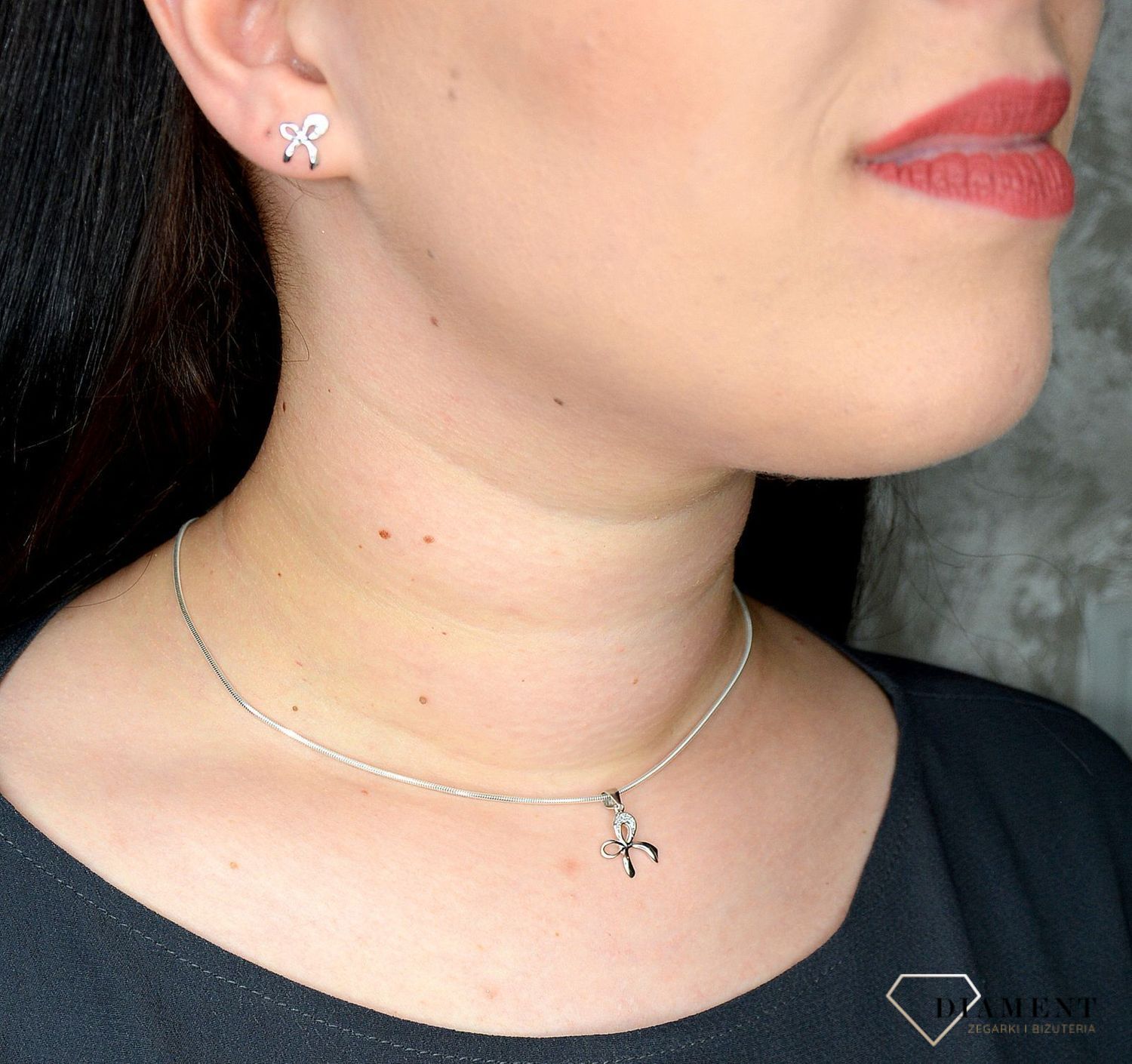 Srebrny komplet biżuterii w kształcie kokardki DIA-KPL-0799-925 (2).jpg