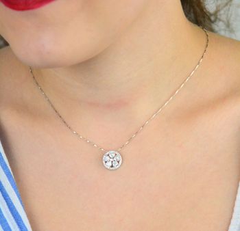 Komplet srebrny DIA-KPL-13452-925 z motywem kwiatka i cyrkoniami. Próba 925, kolczyki (1,0 cm) z zapięciem na sztyft i zawieszka (1,3 cm). Łączna waga 3,40 g. Elegancja i kobiecość w jednym (1).JPG