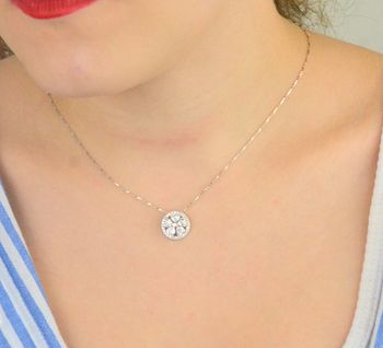 Komplet srebrny DIA-KPL-13452-925 z motywem kwiatka i cyrkoniami. Próba 925, kolczyki (1,0 cm) z zapięciem na sztyft i zawieszka (1,3 cm). Łączna waga 3,40 g. Elegancja i kobiecość w jednym (3).JPG