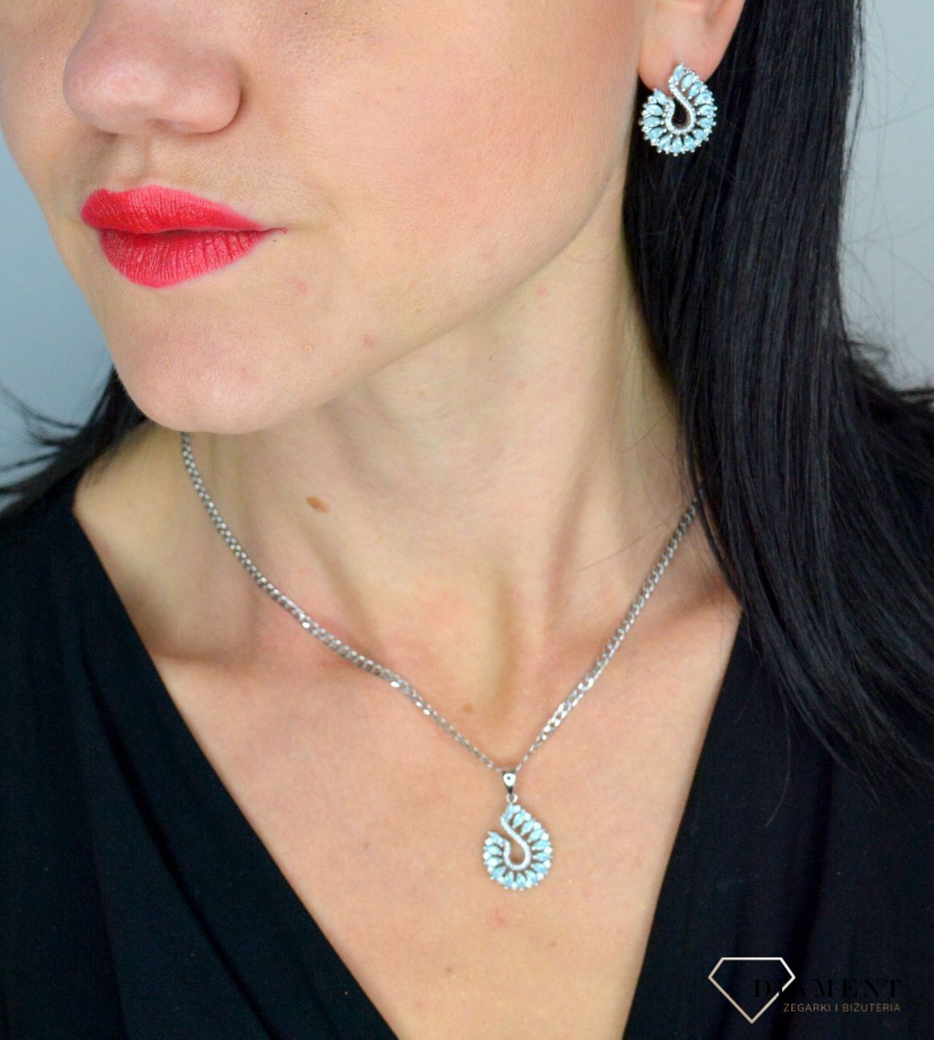 Srebrny komplet biżuterii o zaokrąglonym kształcie z niebieską cyrkonią DIA-KPL-3265-925.jpg