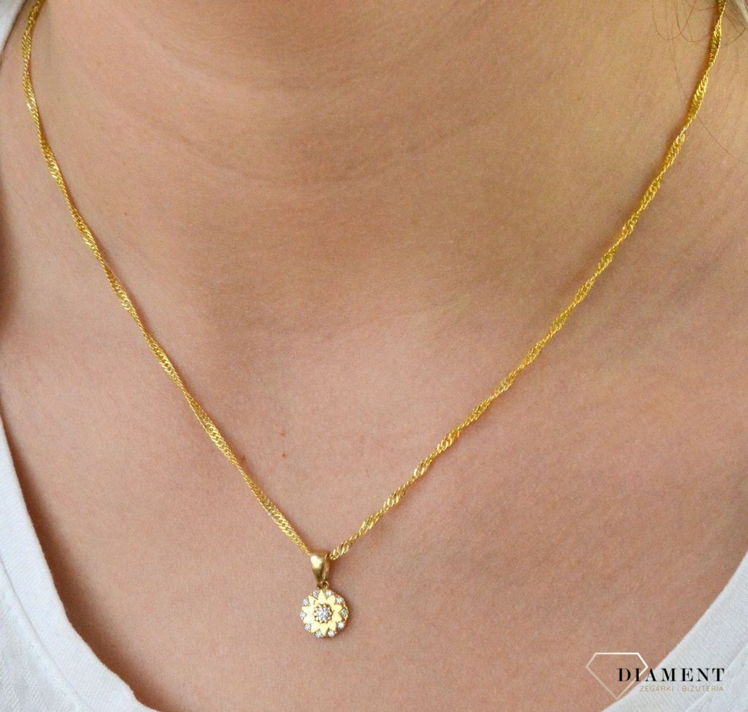 Komplet złotej biżuterii kolczyki i zawieszka kwiatek z cyrkonią DIA-KPL-5300-585.jpg