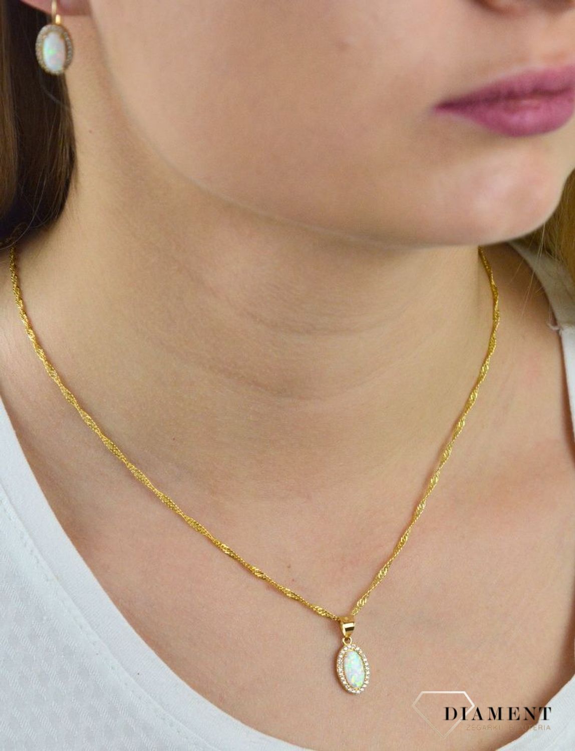 Komplet złotej biżuterii 585 kolczyki i zawieszka z opalem i cyrkonią DIA-KPL-5309-585. Piękny komplet złotej biżuterii to idealna propozycja na prezent dla ukochanej kobiety..jpg