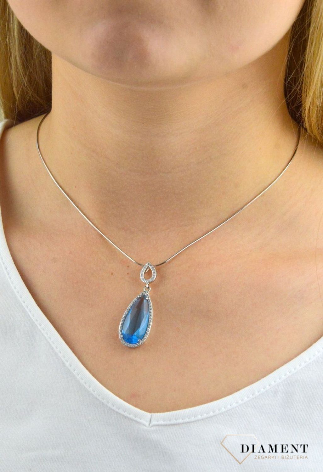 Komplet srebrnej biżuterii Kolczyki i zawieszka Cyrkonie DIA-KPL-6079-925. Komplet srebrnej biżuterii. Komplet zawieszka i kolczyki. Komplet biżuterii z cyrkonią. Idealny komplet biżuterii na prezent..jpg