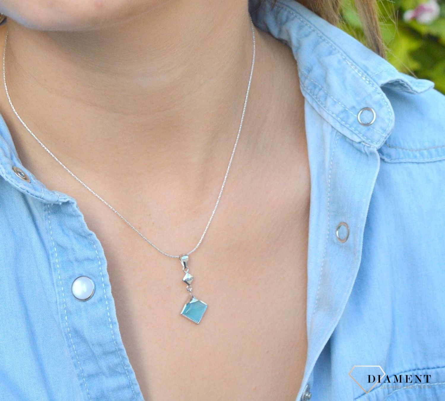 Komplet srebrny damski z niebieskimi cyrkoniami DIA-KPL-6630N-925. Komplet srebrny zawieszka i kolczyki. Komplet damski, dziecięcy. Komplet srebrny z cyrkonią niebieską. Komplet srebrny idealny pomysł na prezent..jpg