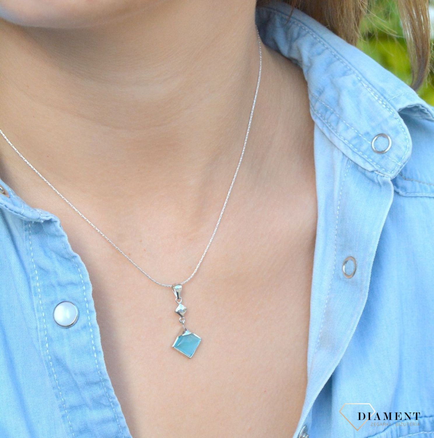 Komplet srebrny damski z niebieskimi cyrkoniami DIA-KPL-6630N-925. Komplet srebrny zawieszka i kolczyki. Komplet damski, dziecięcy. Komplet srebrny z cyrkonią niebieską. Komplet srebrny idealny pomysł na prezent..jpg