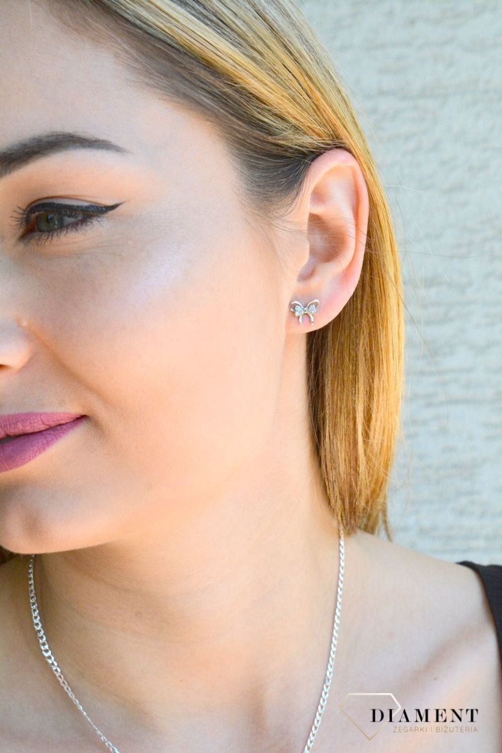 Srebrny komplet damski kolczyki zawieszka kokardki z cyrkoniami DIA-KPL-9421-925c.jpg