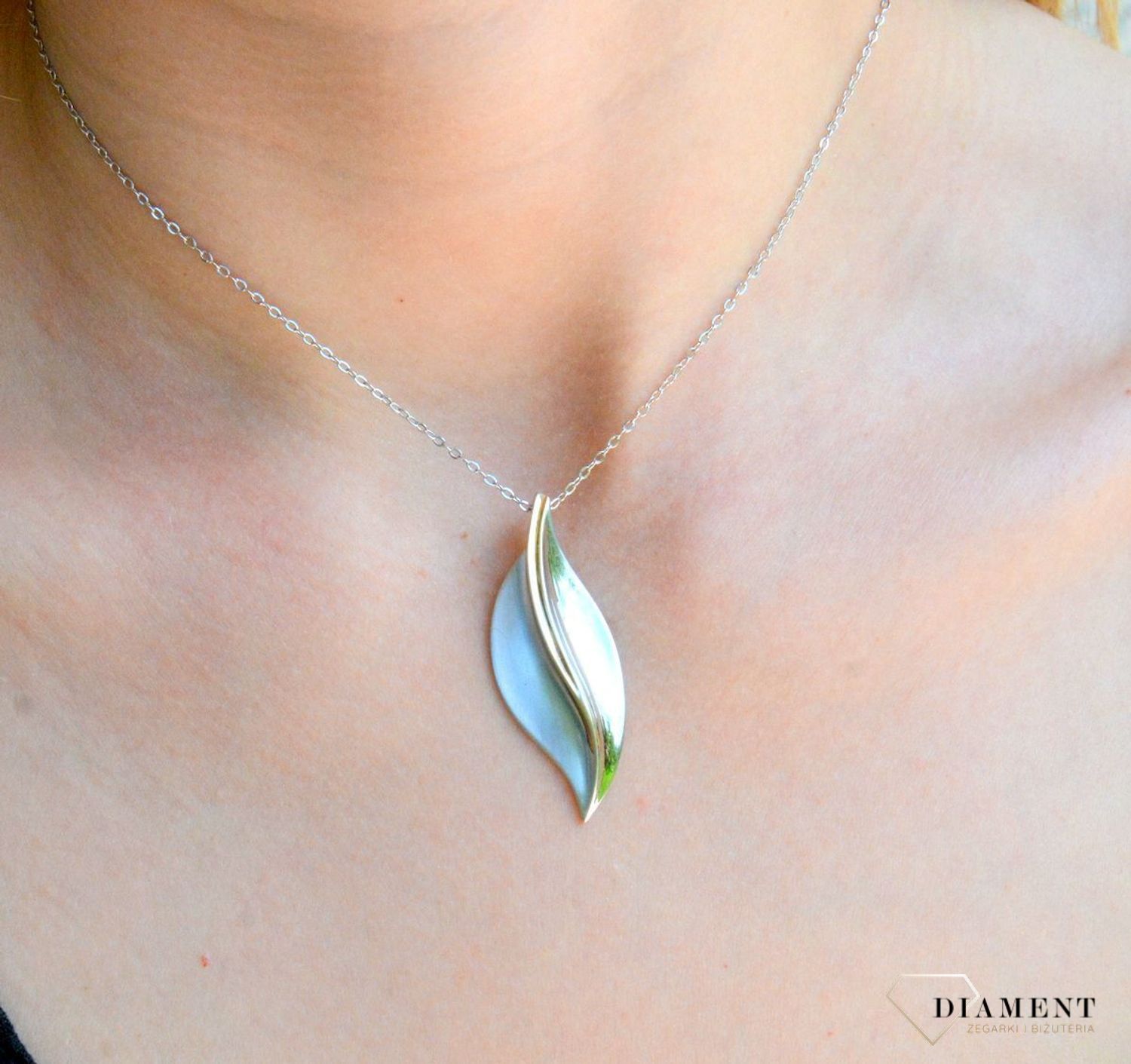 Srebrny komplet biżuterii podłużny z elementem pokrytym złotem DIA-KPL-9447-925d.jpg