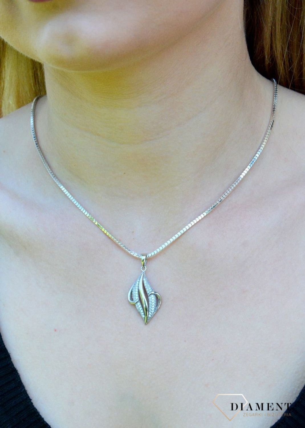 Srebrny komplet biżuterii efektowne kolczyki i zawieszka z cyrkoniami DIA-KPL-9462-925d.jpg