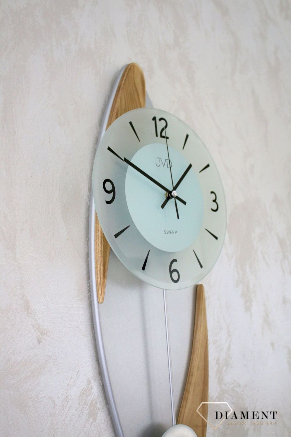 Ścienny zegar wahadłowy JVD NS1800978.png