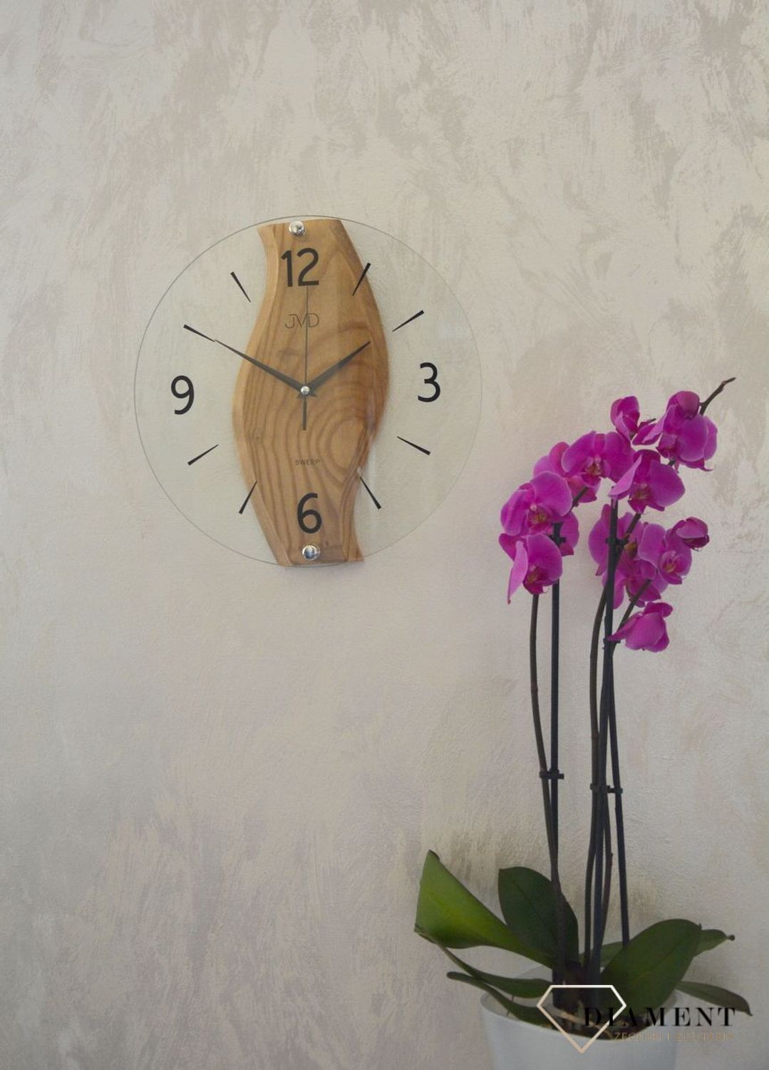 Zegar ścienny drewniany ze szkłem JVD dąb NS19036.78 ✅ Nowoczesny zegar ścienny do salonu JVD wykonany ze szkła oraz dodatku drewnianych elementów. ✅ (1).JPG