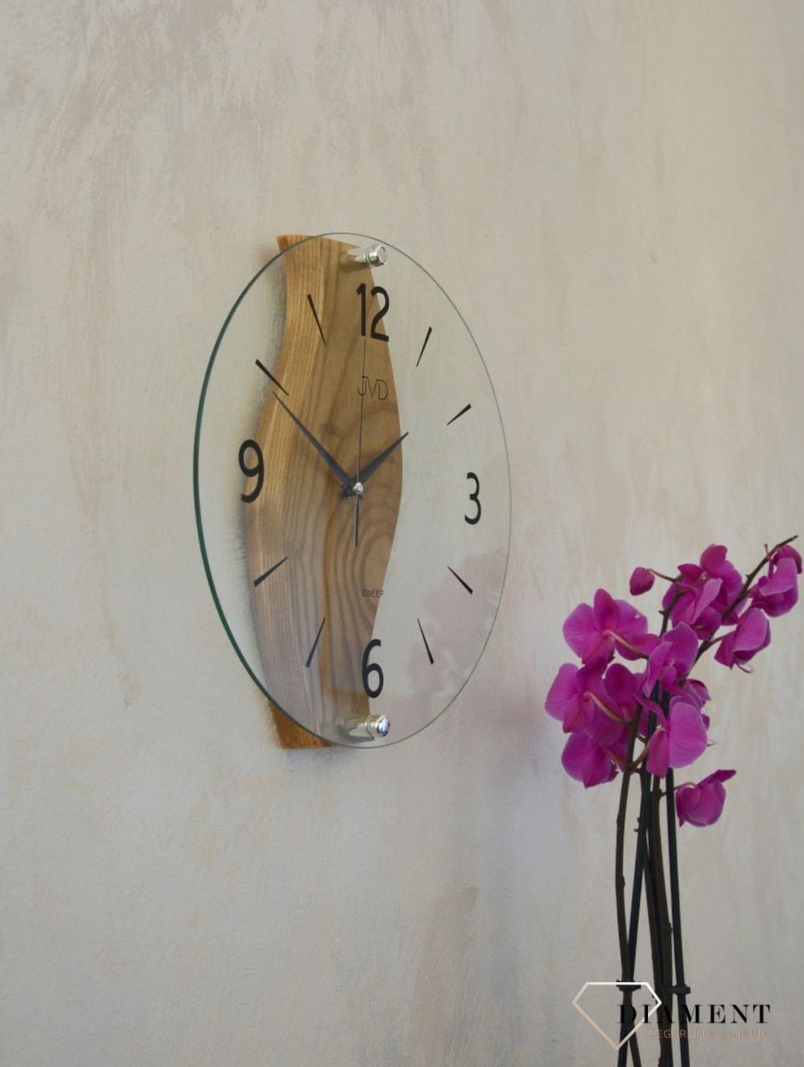 Zegar ścienny drewniany ze szkłem JVD dąb NS19036.78 ✅ Nowoczesny zegar ścienny do salonu JVD wykonany ze szkła oraz dodatku drewnianych elementów. ✅ (1).JPG