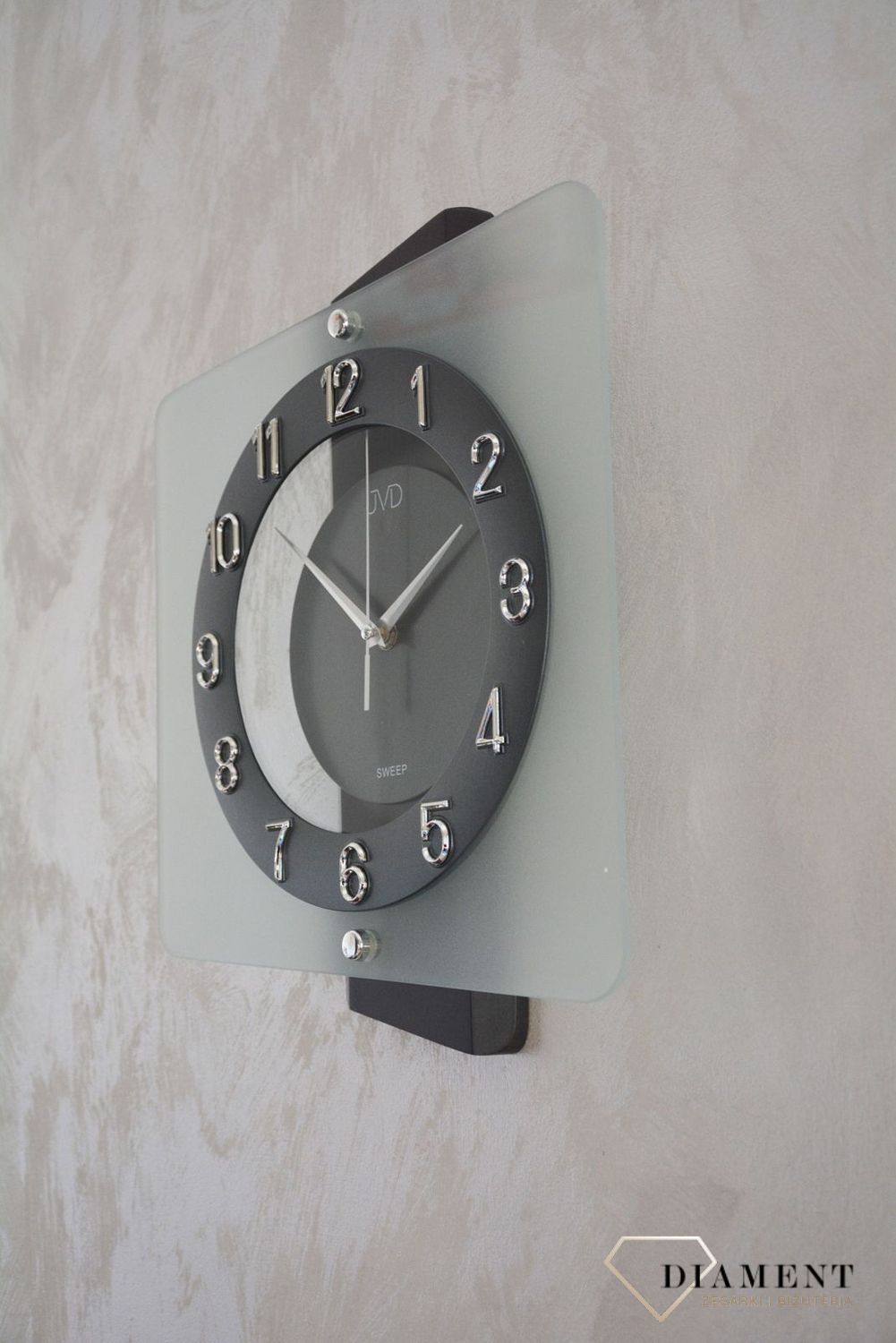 Nowoczesny zegar ścienny w kwadratowej obudowie ze szkłem NS20133.1.jpg