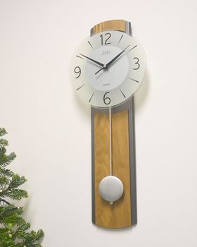 Elegancki zegar ścienny JVD NS22017.78 z drewna w kolorze brązowo-antracytowym. Cicha praca dzięki płynnemu sekundnikowi i dekoracyjne wahadło. Idealny do klasycznych i nowoczesnych wnętrz (.JPG