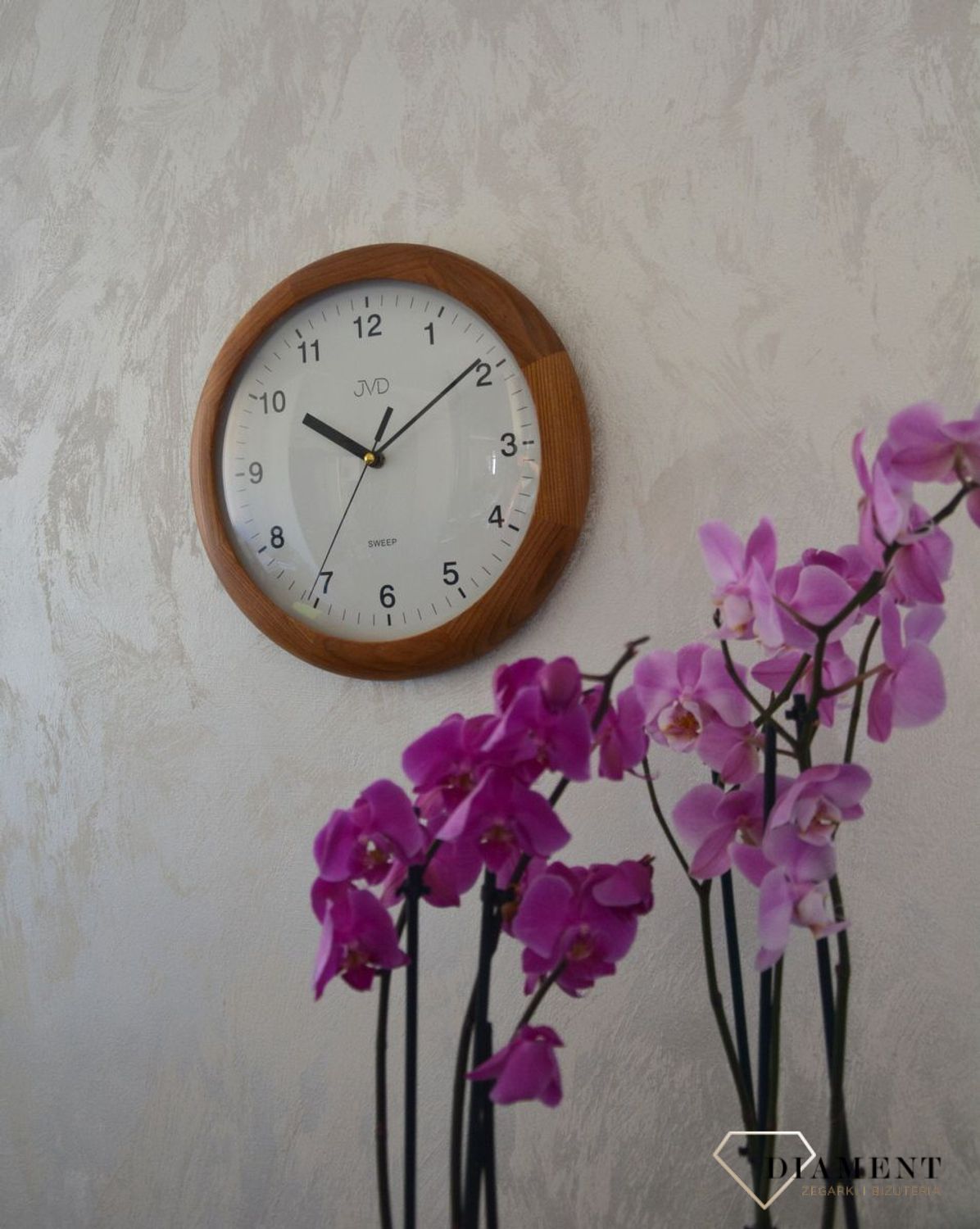 Zegar ścienny drewniany okrągły JVD ciemny dąb NS2341.11 ✅ Zegar ścienny okrągły wykonany z drewna w kolorze ciemnego dębu. ✅.jpg