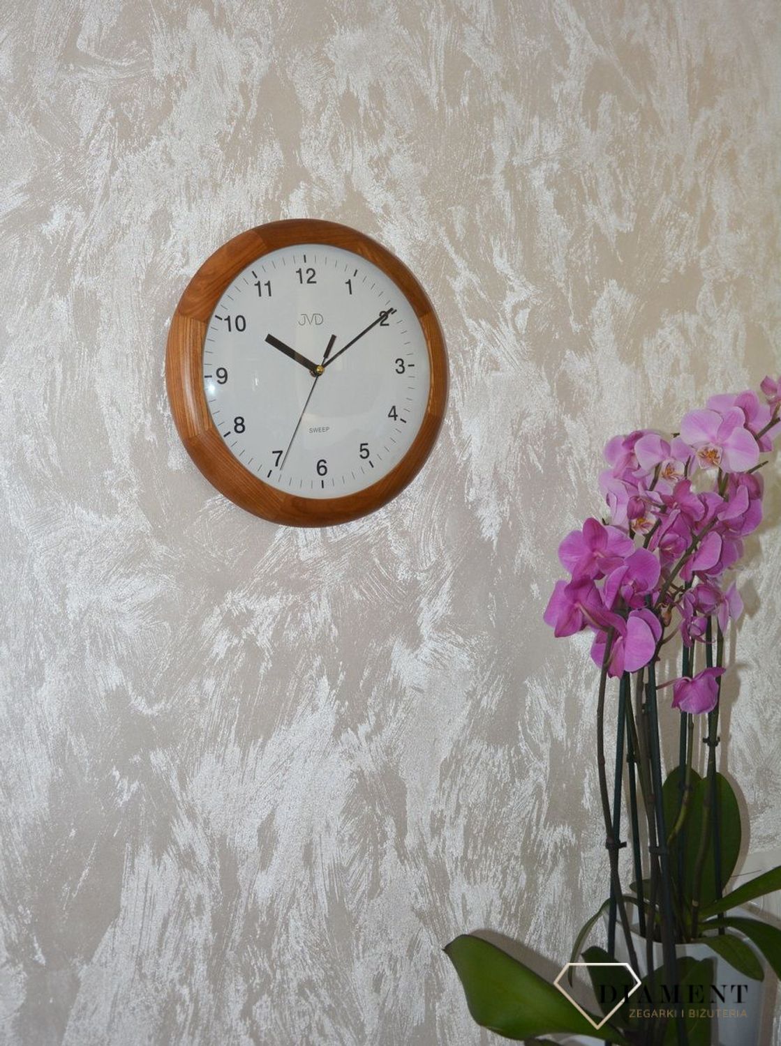 Zegar ścienny drewniany okrągły JVD ciemny dąb NS2341.11 ✅ Zegar ścienny okrągły wykonany z drewna w kolorze ciemnego dębu. ✅.jpg