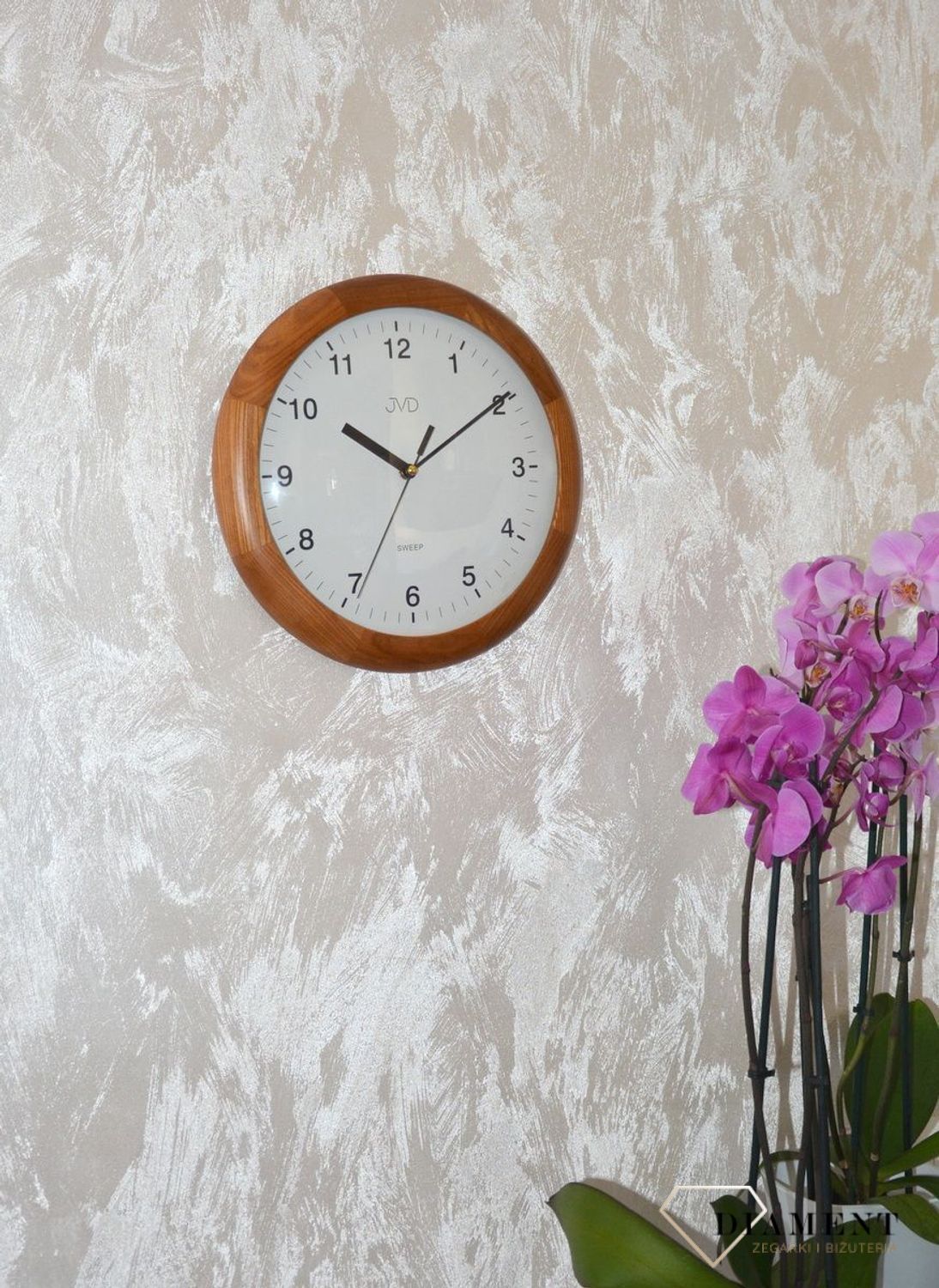 Zegar ścienny drewniany okrągły JVD ciemny dąb NS2341.11 ✅ Zegar ścienny okrągły wykonany z drewna w kolorze ciemnego dębu. ✅.jpg