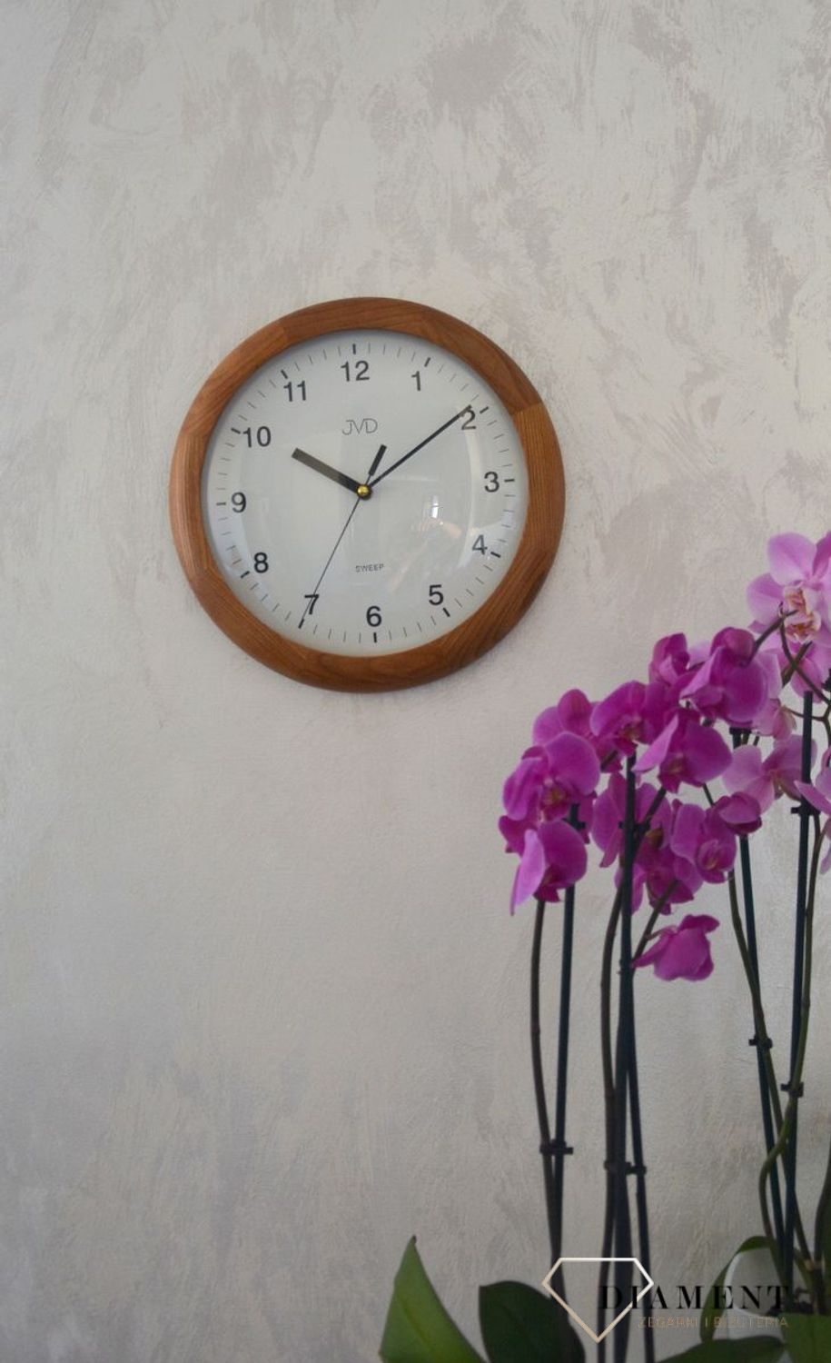Zegar ścienny drewniany okrągły JVD ciemny dąb NS2341.11 ✅ Zegar ścienny okrągły wykonany z drewna w kolorze ciemnego dębu. ✅.jpg