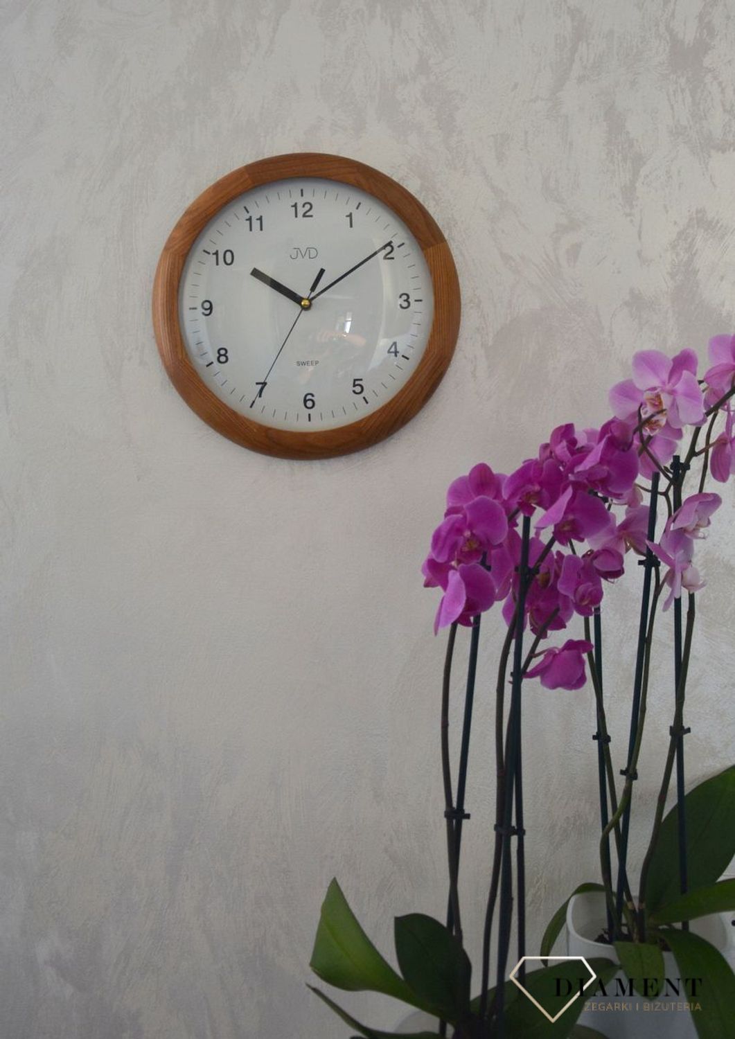 Zegar ścienny drewniany okrągły JVD ciemny dąb NS2341.11 ✅ Zegar ścienny okrągły wykonany z drewna w kolorze ciemnego dębu. ✅.jpg