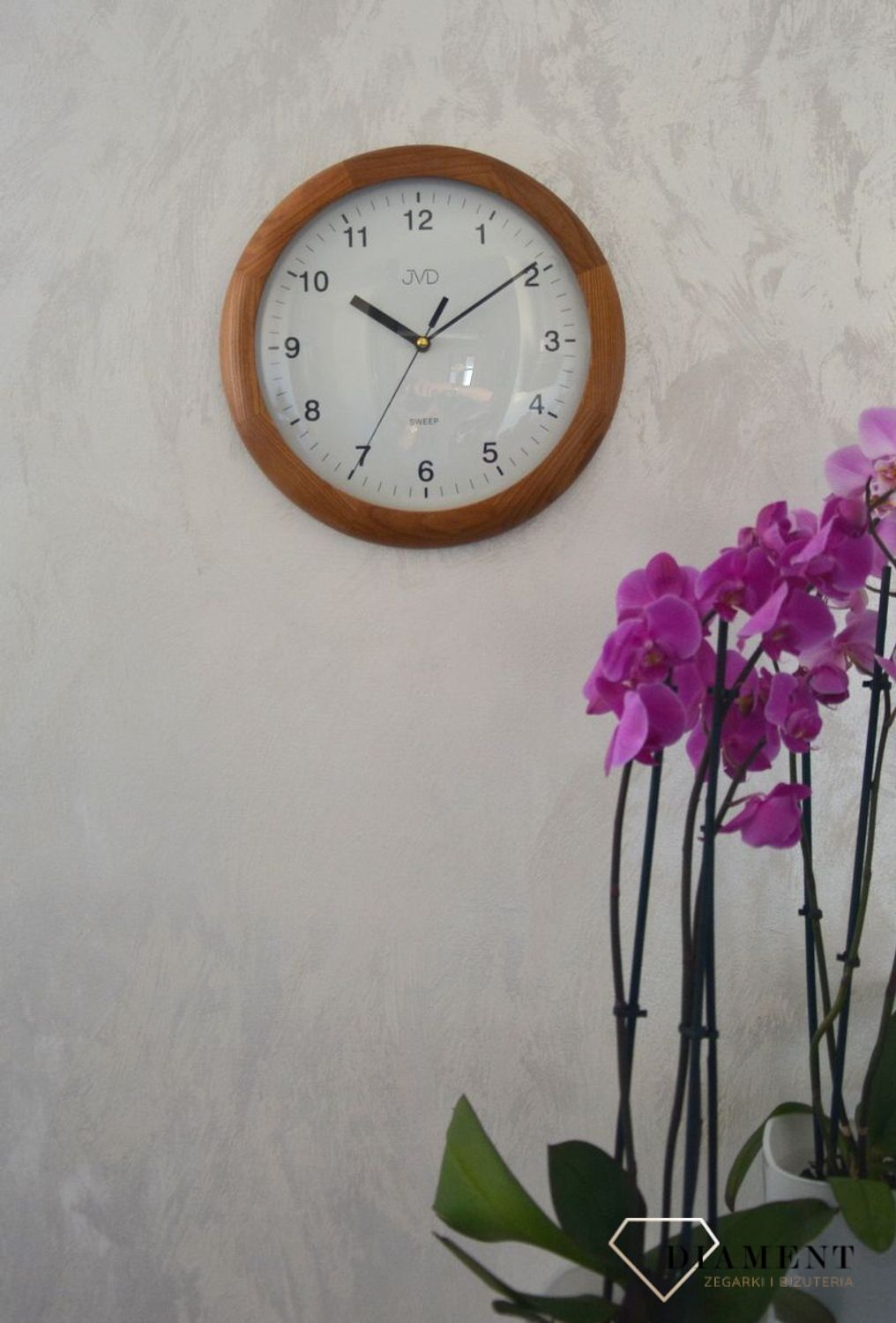 Zegar ścienny drewniany okrągły JVD ciemny dąb NS2341.11 ✅ Zegar ścienny okrągły wykonany z drewna w kolorze ciemnego dębu. ✅.jpg