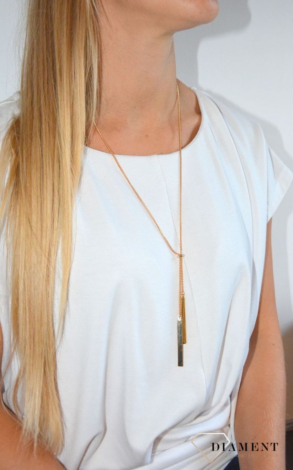 Naszyjnik damski pozłacany krawatka zakończona patyczkami.jpg