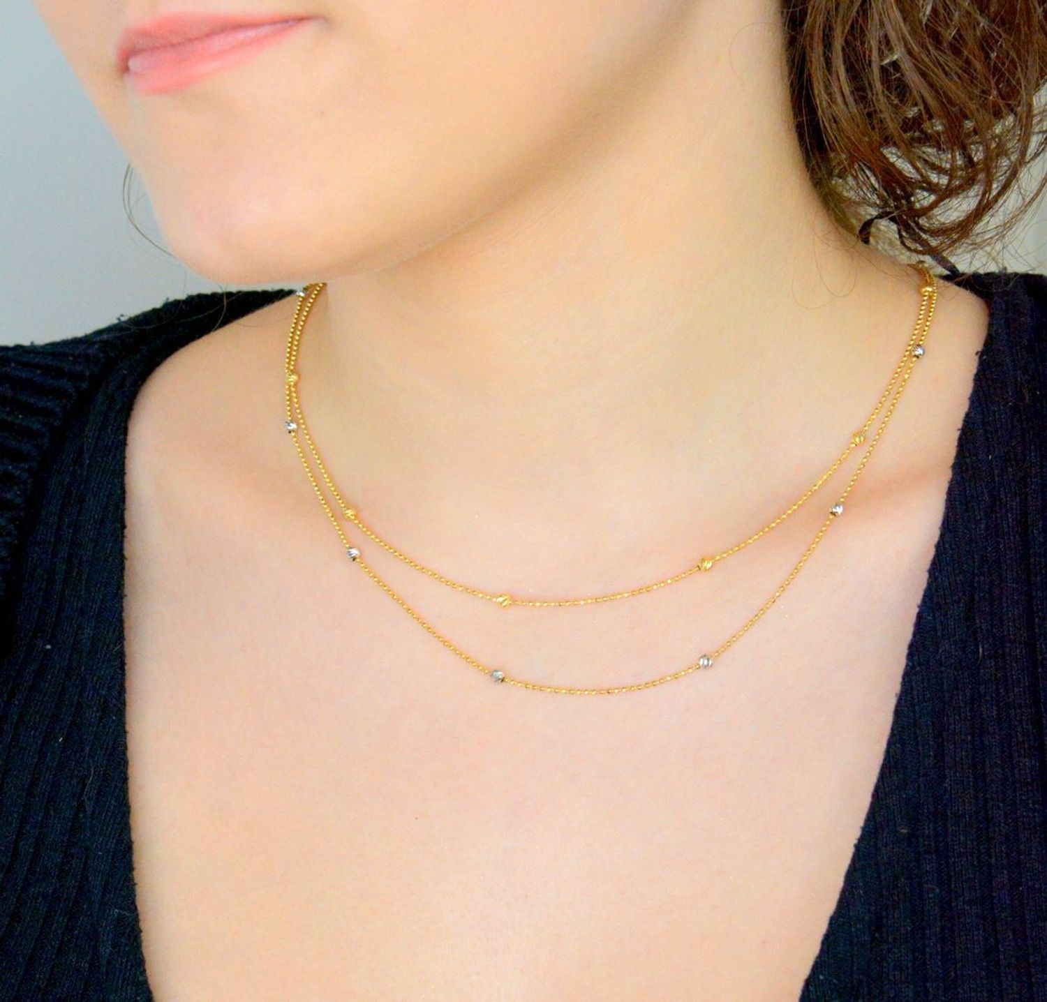 Złoty naszyjnik damski z kuleczkami białe i żółte złoto DIA-NSZ-10881-585. Delikatny naszyjnik kuleczki wykonany z najwyższej jakości złota próby 585. 1.jpg