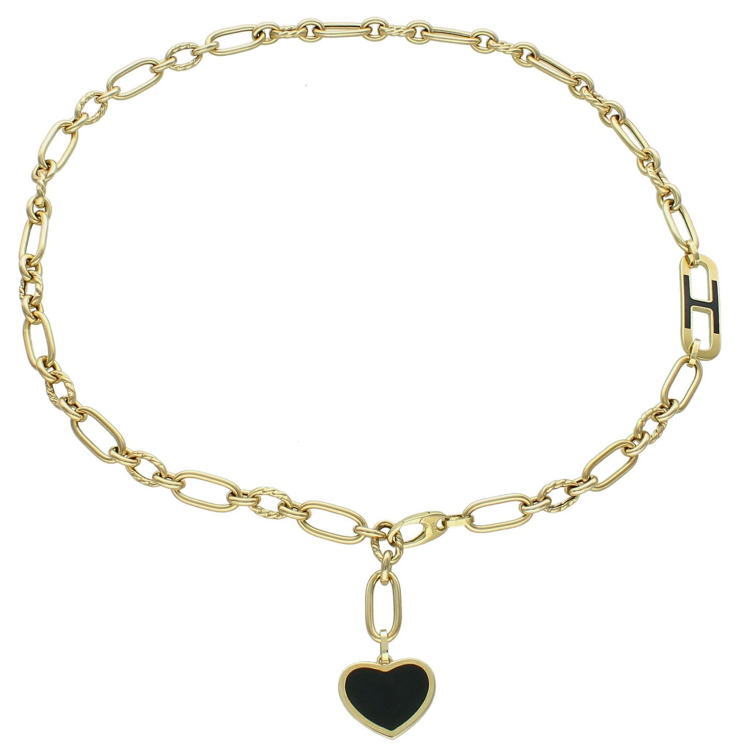 Naszyjnik złoty z czarnym serce pr 585, DIA-NSZ-10998-585 Efektowny naszyjnik wykonany z najwyższej jakości złota próby 585. Łańcuszek z owalnych grubych ogniwek zdobionym sercem z onyksem.1.jpg