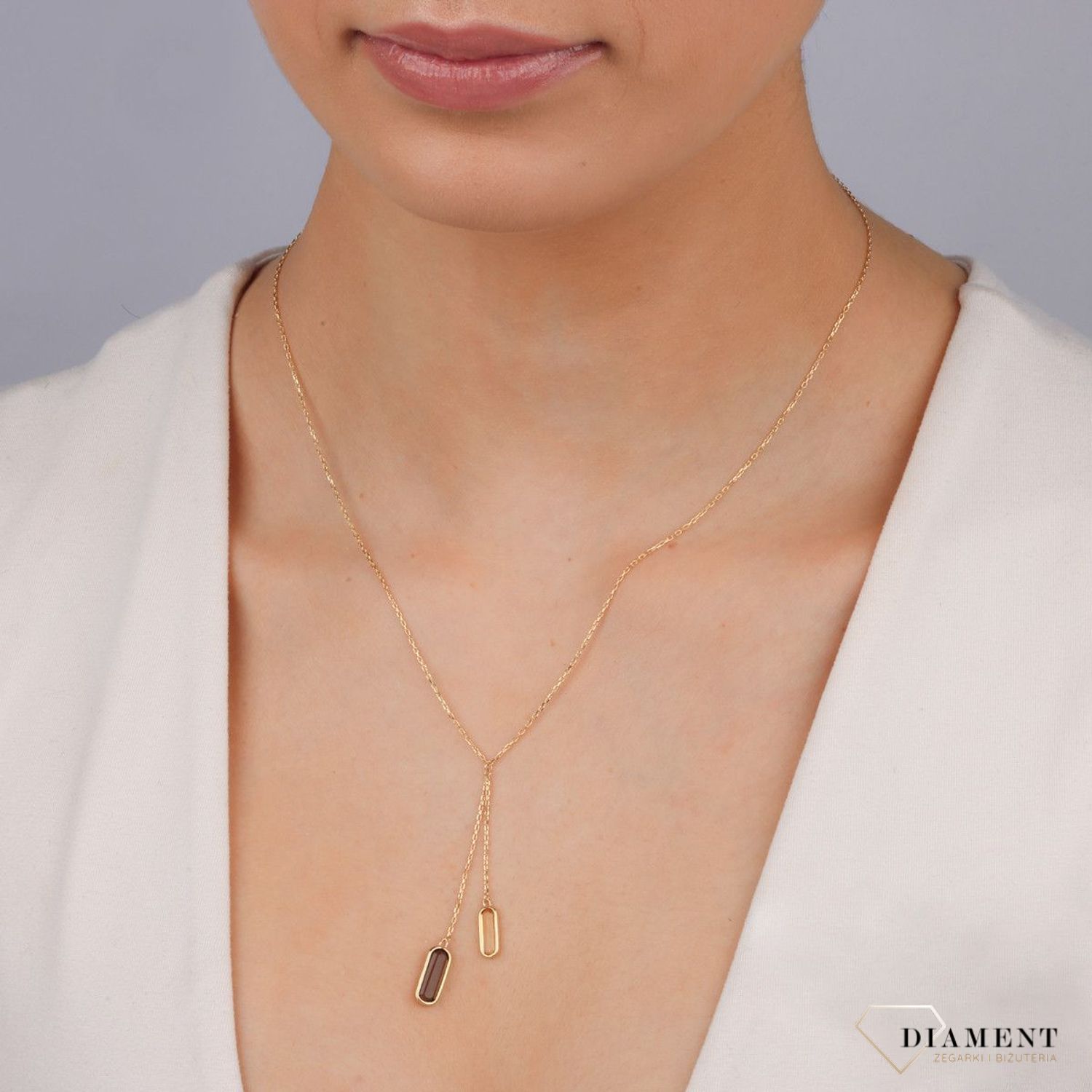 Złoty naszyjnik damski 375 Złota Celebrytka z naturalnym Kwarcem Dymnym i Cytrynem Złoty naszyjnik damski z naturalnym kamieniem. Damska celebrytka wykonana z 9 karatowego złota. Damski naszyjnik idealny na prezent..jpg