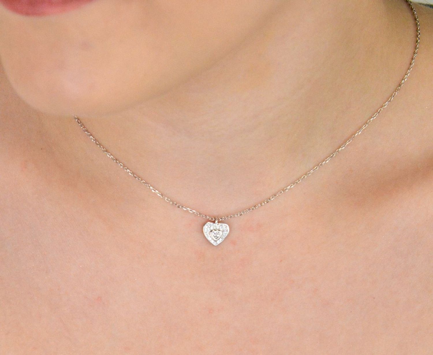 Naszyjnik celebrytka DIA-NSZ-13359-925 ze srebra próby 925, z zawieszką w kształcie serduszka z cyrkonią. Długość 42 + 3 cm, waga 2,10 g. Subtelny, kobiecy dodatek idealny na prezent.1.jpg