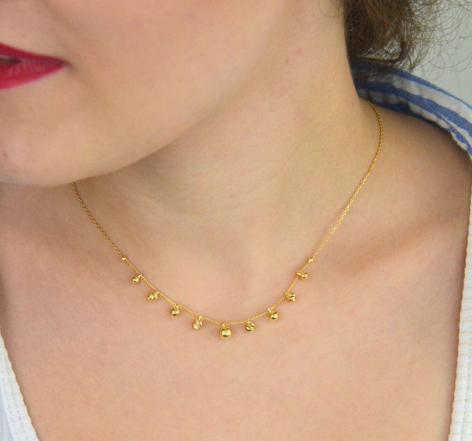 Elegancki złoty naszyjnik damski próby 585 w splocie ankier i pancerka, ozdobiony grawerowanymi kuleczkami. Długość regulowana 42 cm + 3 cm, waga 2,96 g, zapięcie na karabińczyk. 1.jpg