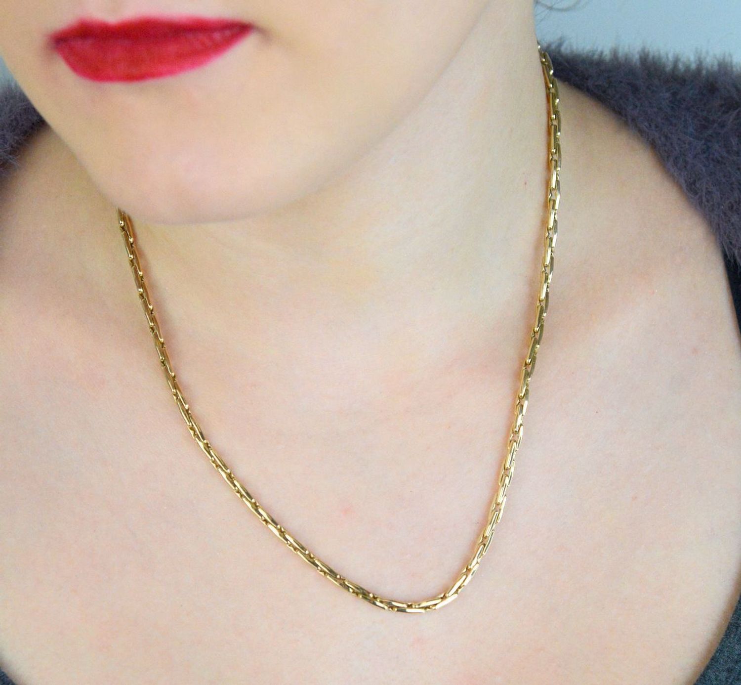 Elegancki naszyjnik złoty 925, zdobiony dwiema kostkami w cyrkonie. Długość 45 cm, waga 8,26 g. Idealny na prezent i codzienną elegancję.1.jpg