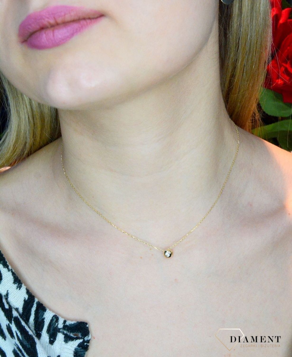 Złoty naszyjnik 585 celebrytka z błyszczącą cyrkonią DIA-NSZ-3-25-N00456-2-585. Niezwykle szykowny i delikatny naszyjnik wykonany z najwyższej jakości 14–karatowego żółtego złota to elegancki dodatek do wielu stylizacji. Idealny nasz.jpg
