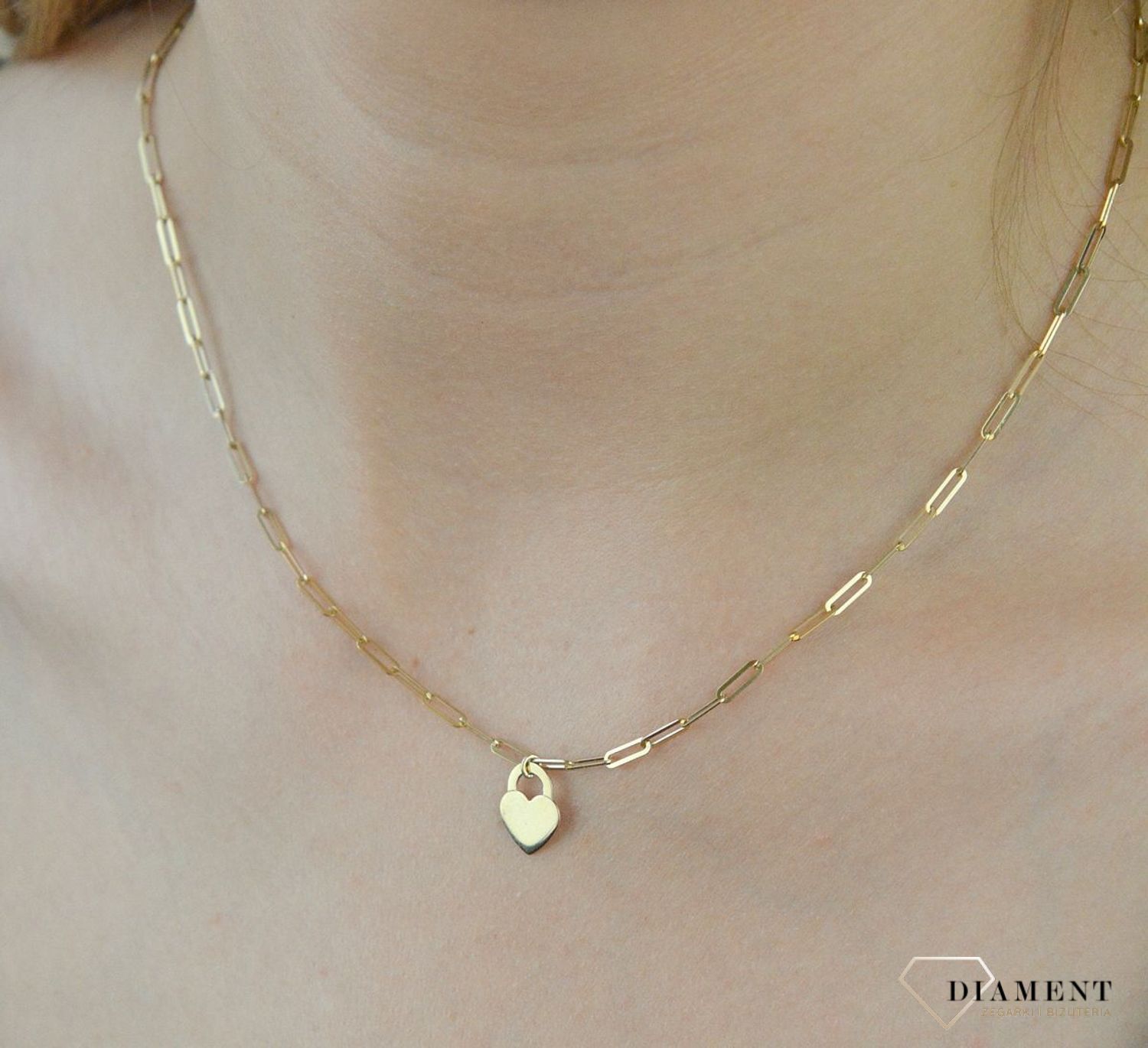 Naszyjnik złoty 585 z zawieszką serce DIA-NSZ-6206-585. Ponadczasowa, klasyczna biżuteria, w której harmonijne wzory wspaniale łączą się z blaskiem żółtego złota. Naszyjnik wykonany z najwyższej jakości zło.jpg