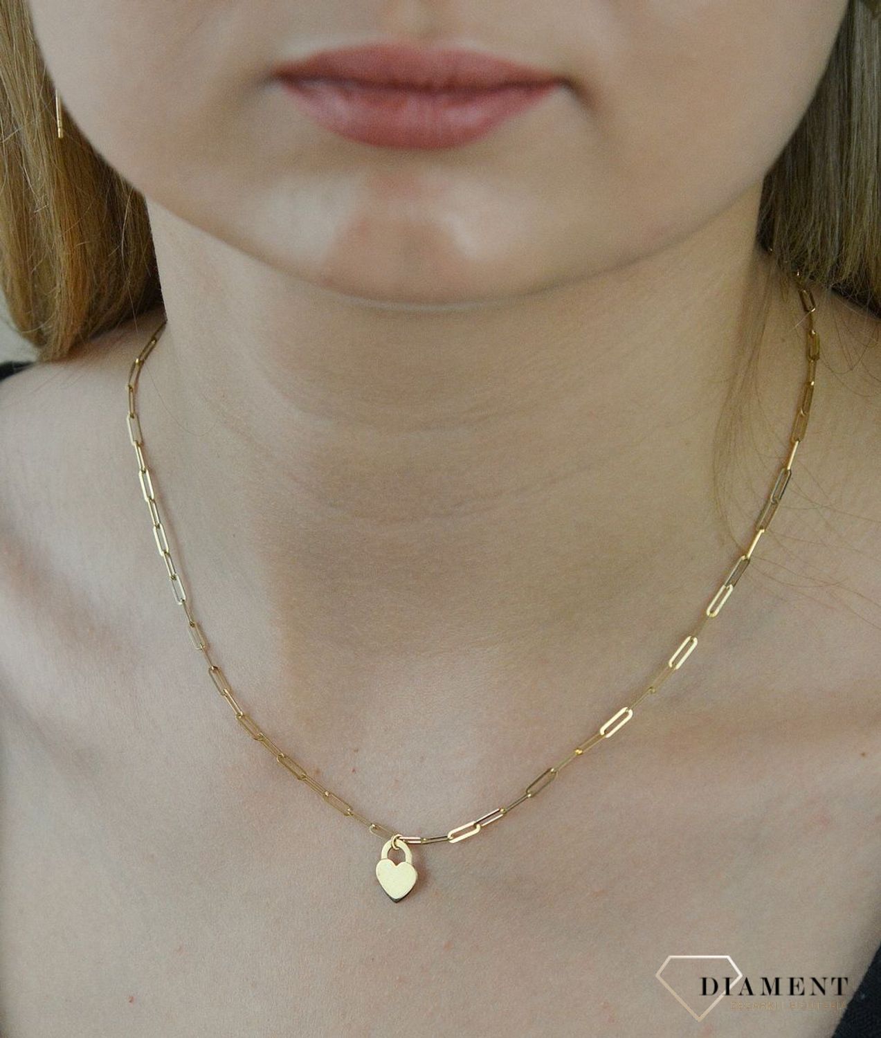 Naszyjnik złoty 585 z zawieszką serce DIA-NSZ-6206-585. Ponadczasowa, klasyczna biżuteria, w której harmonijne wzory wspaniale łączą się z blaskiem żółtego złota. Naszyjnik wykonany z najwyższej jakości zło.jpg