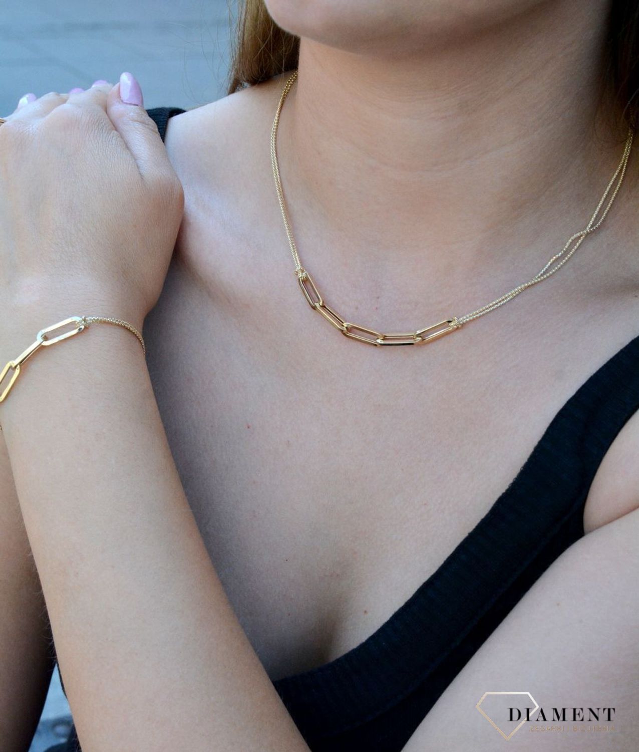 Złoty naszyjnik linka z podłużnymi oczkami DIA-NSZ-6528-585. Naszyjnik złoty damski. Naszyjnik złoty celebrytka. Naszyjnik złoty linka, żmijka. Naszyjnik złoty z elementami ozdobnymi. Naszyjnik złoty idealny na prezent.  (1).jpg