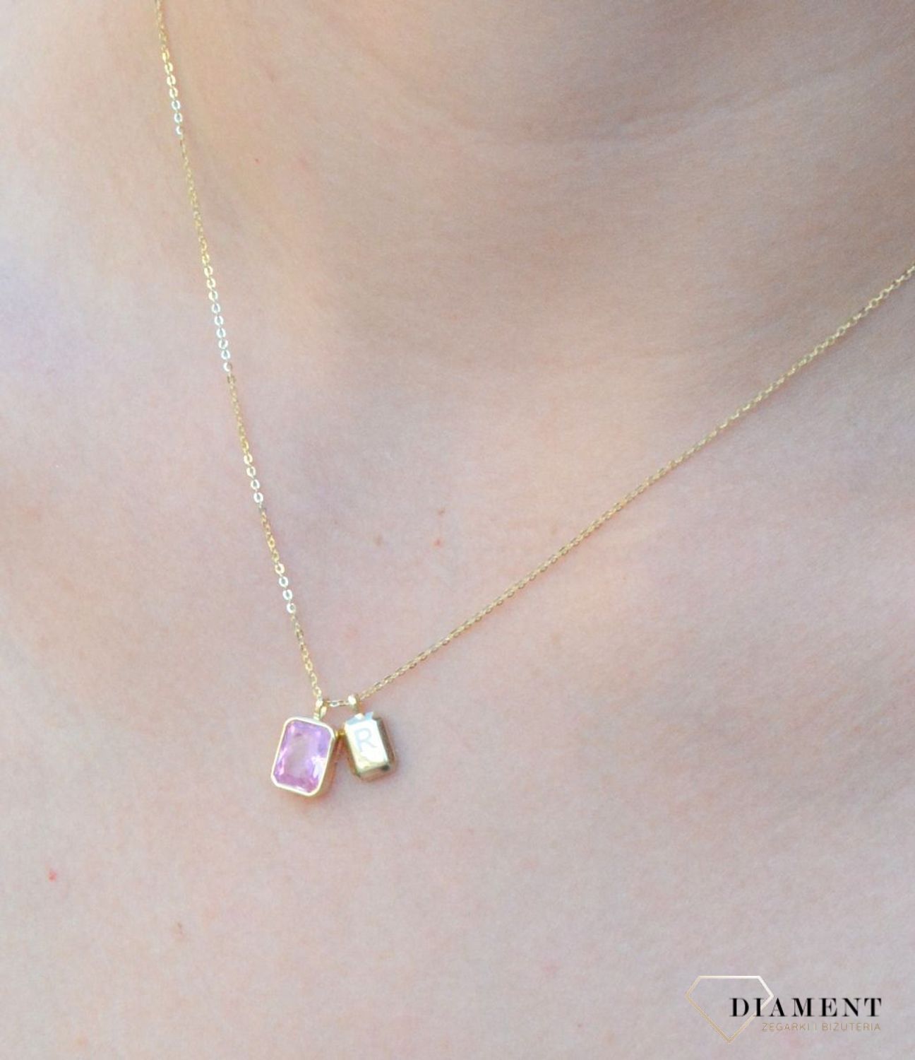 Naszyjnik pozłacany z różową cyrkonią DIA-NSZ-6557-925.  Różowa cyrkonia dzięki wyjątkowemu szlifowi pięknie mieni się w słońcu, co jest wyrazem najwyższego kunsztu jubilerskieg.jpg
