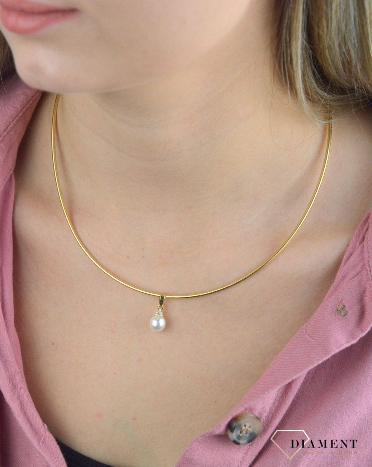 Złoty naszyjnik 585 damski sztywna linka DIA-NSZ-8072-585. Wzór z żółtego złota łączy subtelność podwójnego łańcuszka z harmonią. Biżuteria wspaniale rozświetli dekolt, stanowiąc jednocześnie niezwykle kobiecy element. Waga na.jpg