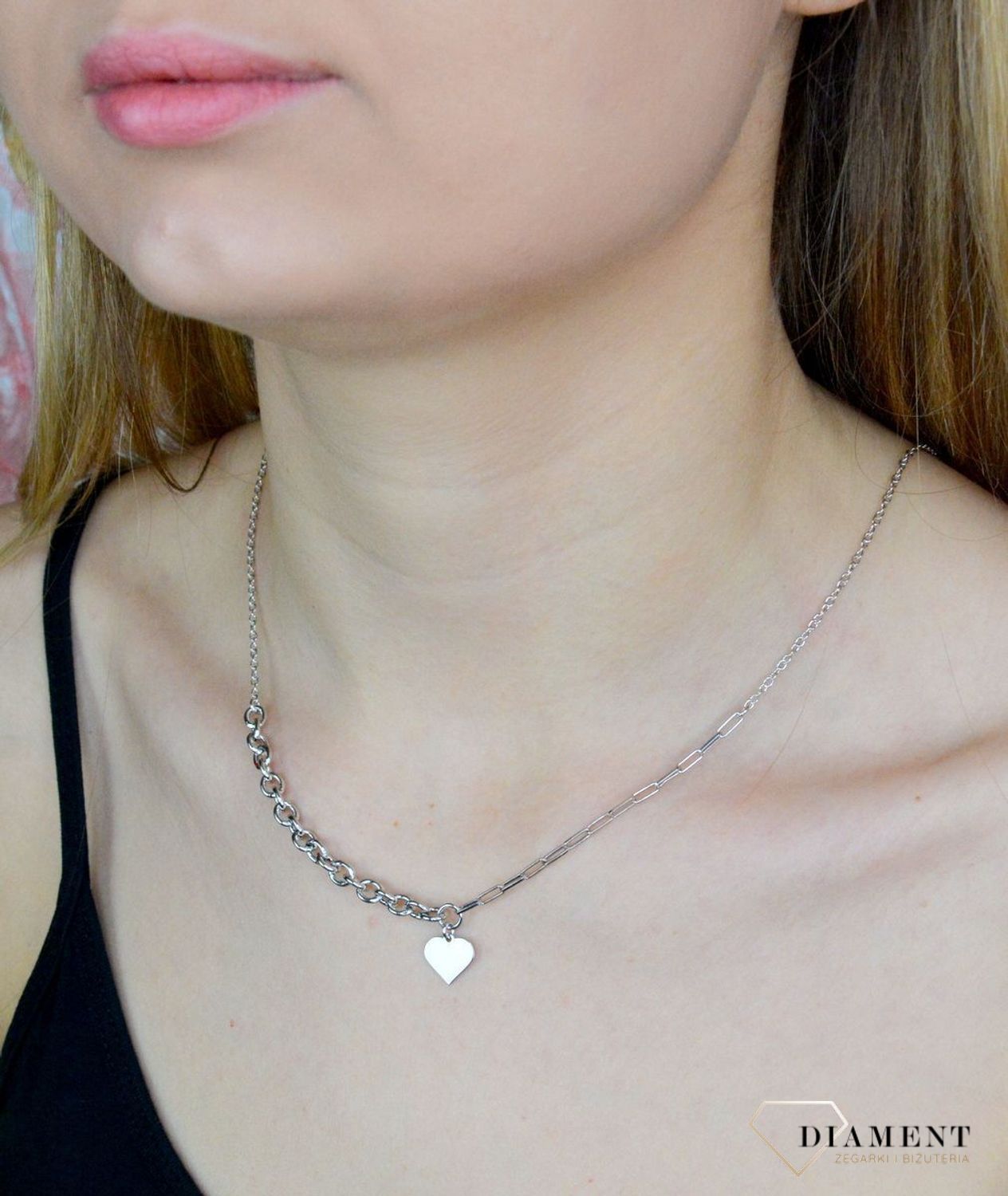Naszyjnik srebrny damski z serduszkiem Hit blogerek DIA-NSZ-9097-925. Niezwykle szykowny naszyjnik wykonany z najwyższej jakości srebra to elegancki dodatek do wielu stylizacji. Naszyjnik będzie świetnym dodatkiem pasującym do.jpg