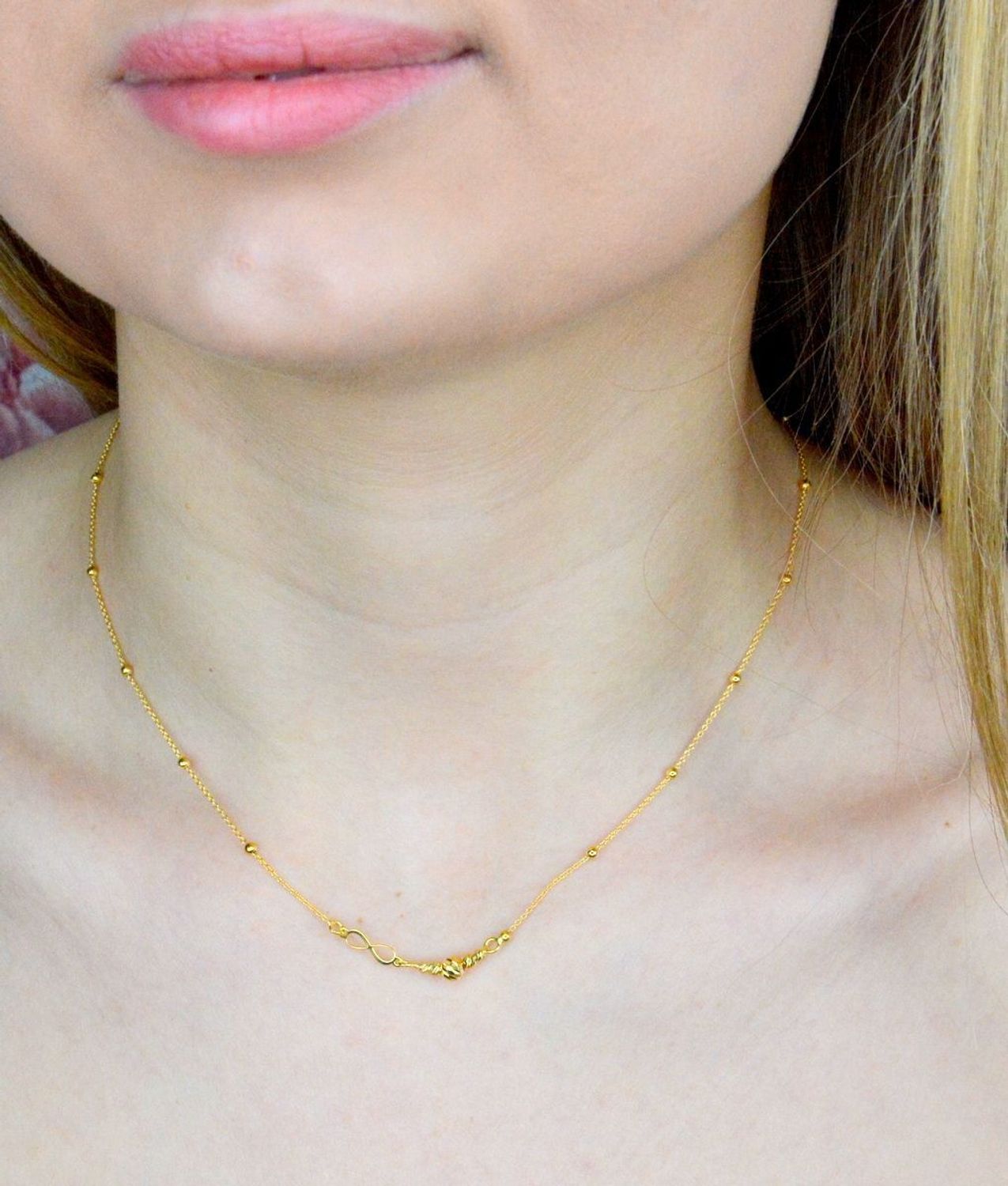 Naszyjnik srebrny pokryty złotem z kuleczkami DIA-NSZ-9106-925. Naszyjnik wykonany z najwyższej próby srebra o podwójnym splocie ankier z ozdobnymi kuleczkami umieszczonymi po całości naszyjnika. Naszyjnik srebrny pokryty złot.jpg