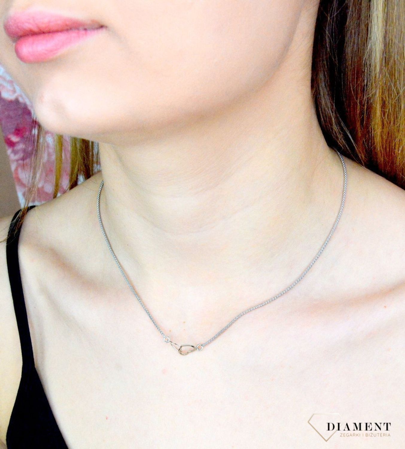 Naszyjnik srebrny damski celebrytka 'Dwa serduszka' DIA-NSZ-9119-925. Naszyjnik wykonany z najwyższej próby srebra z ozdobnym splotem łańcuszka połączony z dwoma serduszkami. Naszyjnik dla ukochanej..jpg