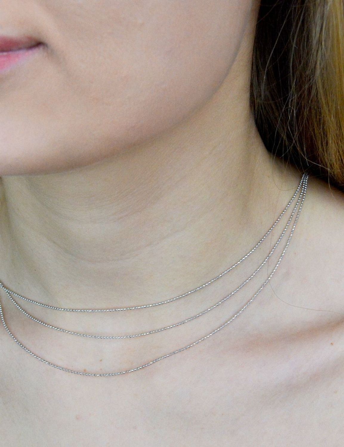 Srebrny naszyjnik z kuleczek potrójny DIA-NSZ-APARTI22-925. Doskonały pomysł na prezent dla każdej kobiety. Oryginalna, prosta biżuteria. Srebrny łańcuszek składający się z delikatnych kuleczek.jpg