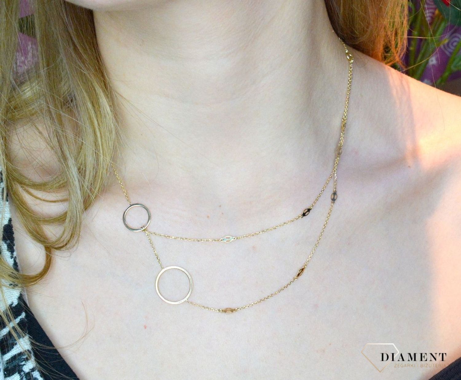 Złoty naszyjnik 585 celebrytka z kółeczkami DIA-NSZ-C13364-585.  Niezwykły blask szlachetnego kruszcu zamknięty w wyjątkowej formie. Subtelny kontur elementów ozdobnych perfekcyjnie prezentuje się z klasycznym łańcuszkie.jpg