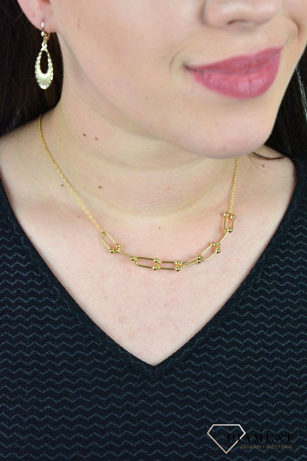 Złoty naszyjnik ozdobiony równymi ogniwami z kuleczkami w środku DIA-NSZ-CL02522--585.jpg
