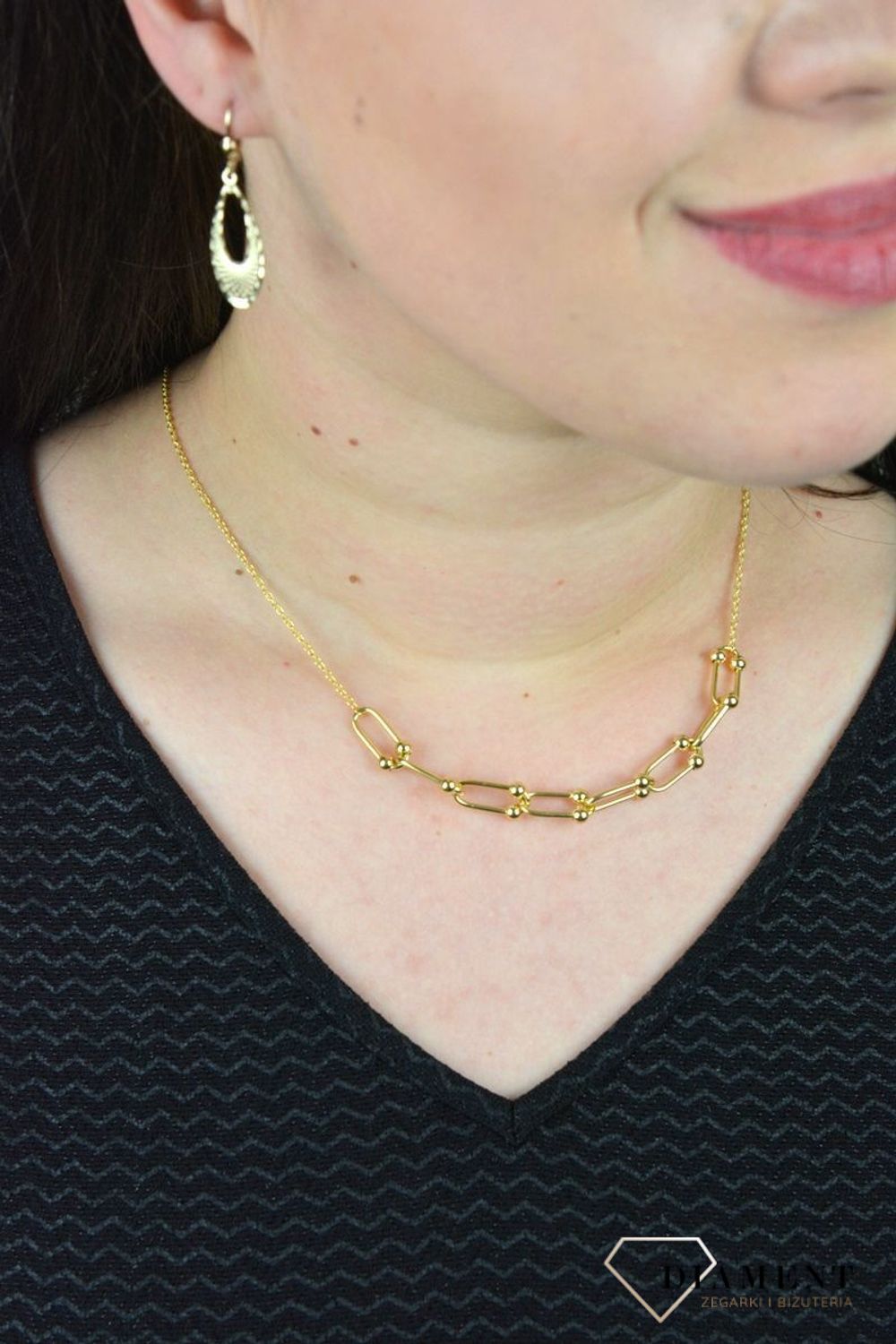 Złoty naszyjnik ozdobiony równymi ogniwami z kuleczkami w środku DIA-NSZ-CL02522--585.jpg
