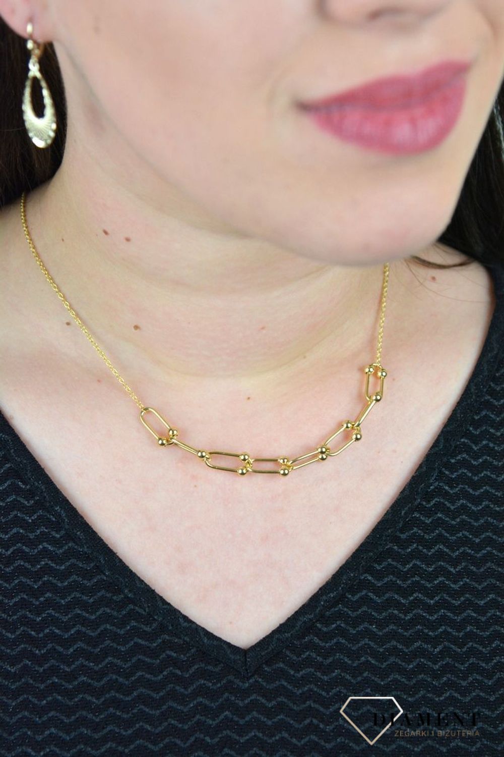 Złoty naszyjnik ozdobiony równymi ogniwami z kuleczkami w środku DIA-NSZ-CL02522--585.jpg