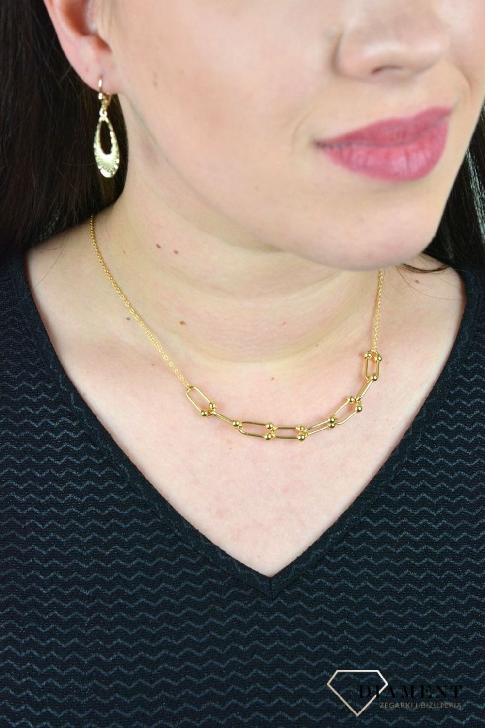 Złoty naszyjnik ozdobiony równymi ogniwami z kuleczkami w środku DIA-NSZ-CL02522--585.jpg